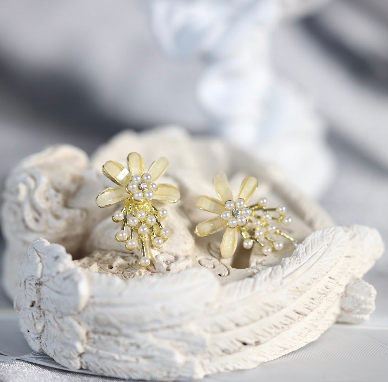 White pearl and floral studs