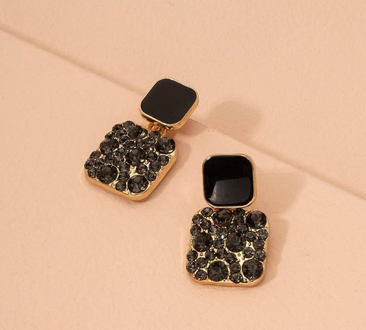Black square studs