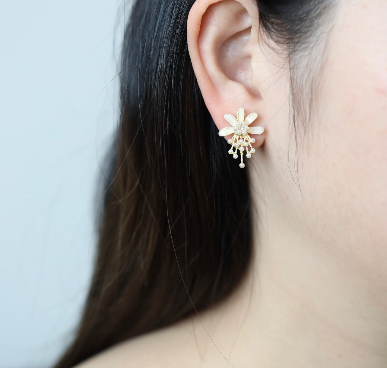 White pearl and floral studs
