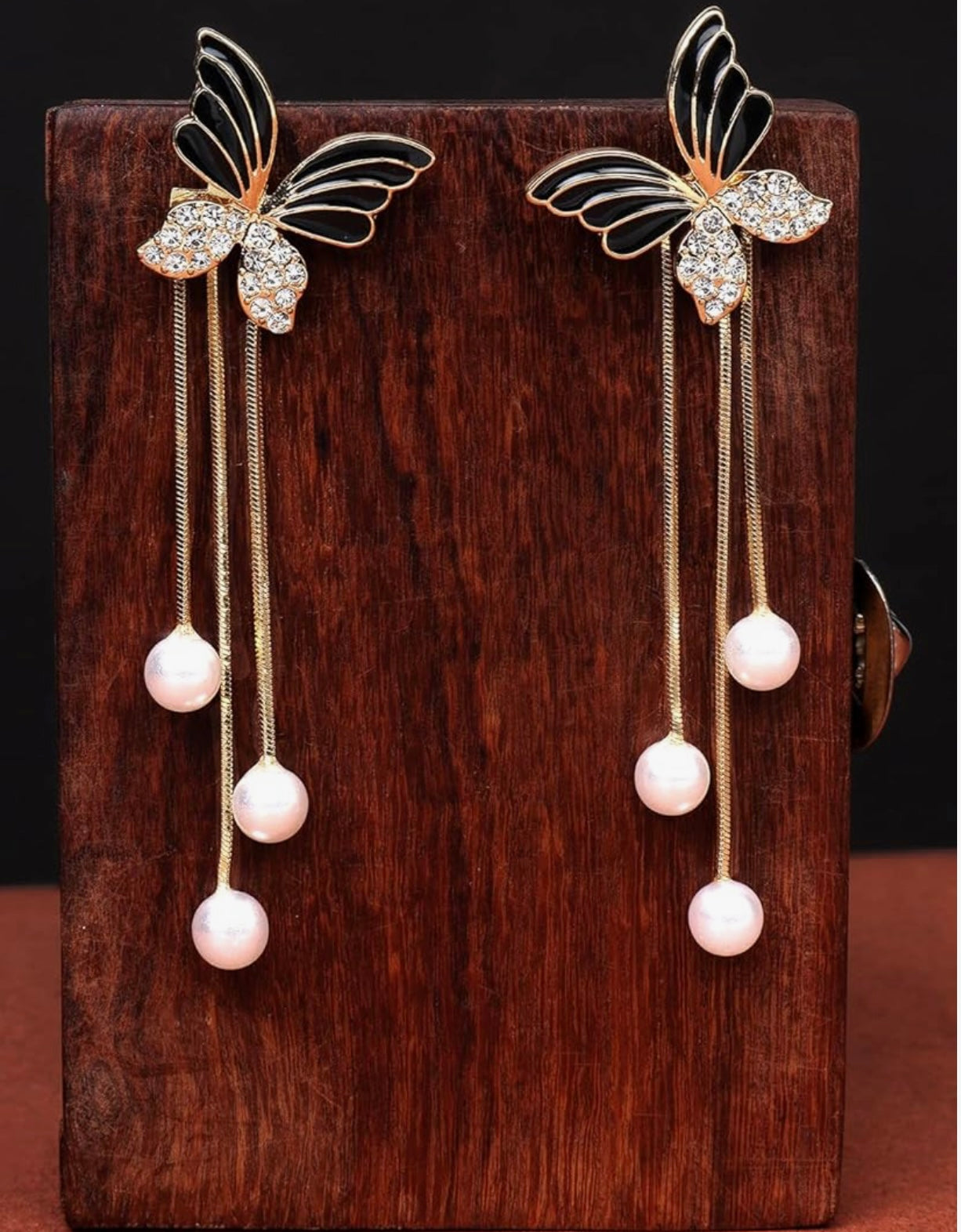 Black butterfly tassel earrings