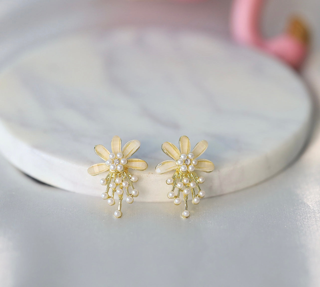 White pearl and floral studs