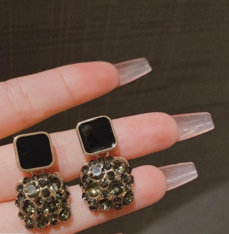 Black square studs
